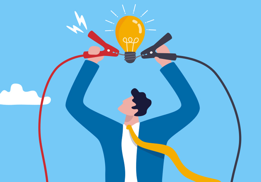 A graphic illustration of a man holding his hands above his head. In each hand is a wire. One wire is red and the other is black. The wires are connected to a glowing light bulb that hovers over the man.