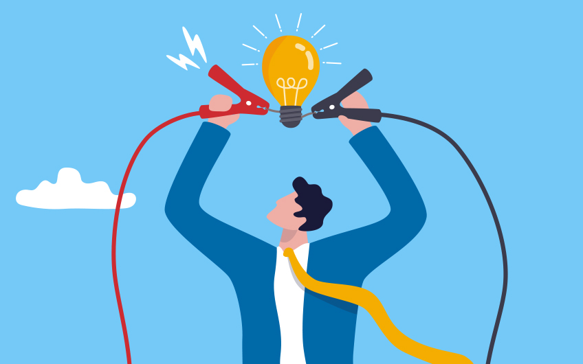 A graphic illustration of a man holding his hands above his head. In each hand is a wire. One wire is red and the other is black. The wires are connected to a glowing light bulb that hovers over the man.